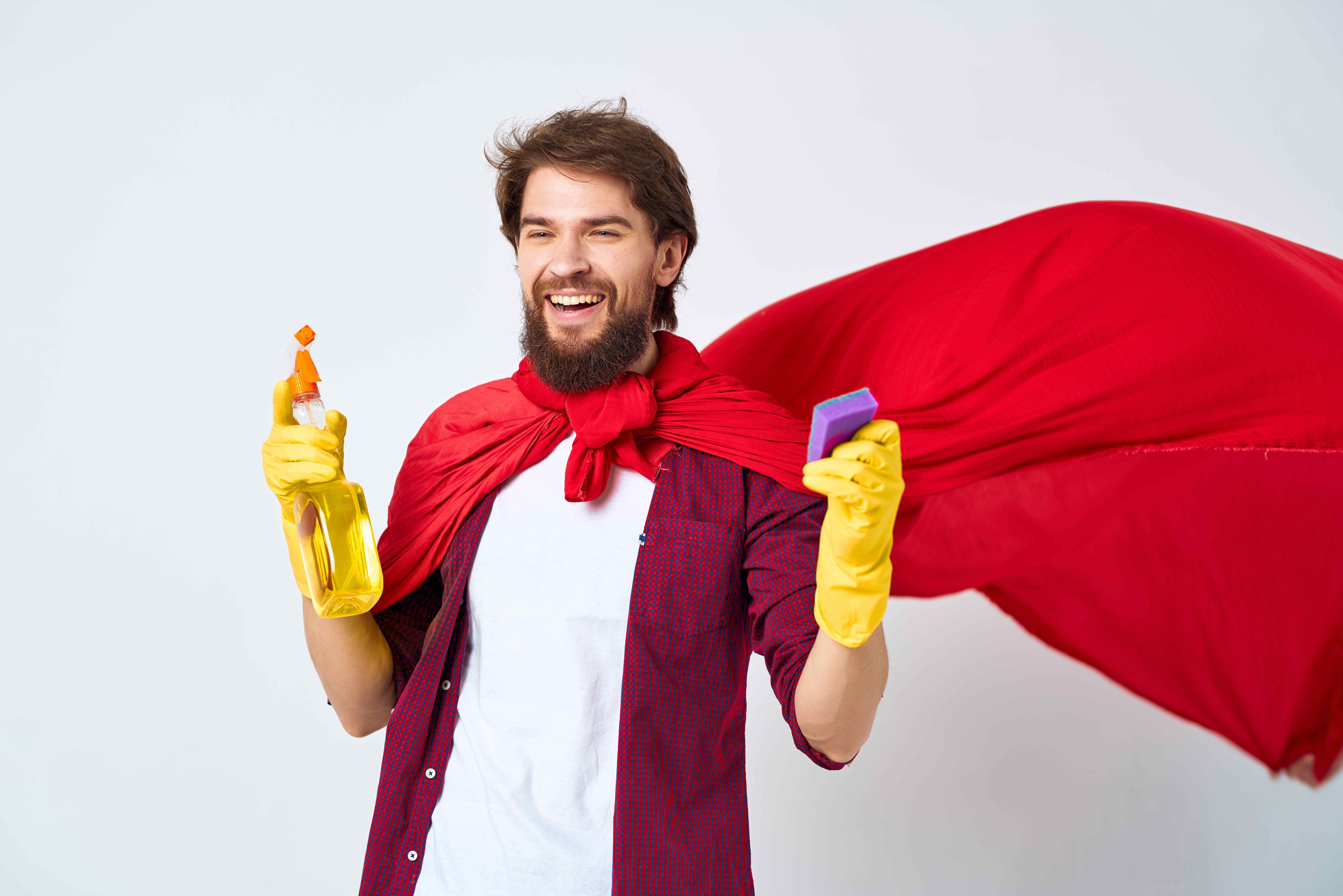 a-man-sitting-on-the-floor-red-cloak-cleaning-the-2023-11-27-05-02-23-utc