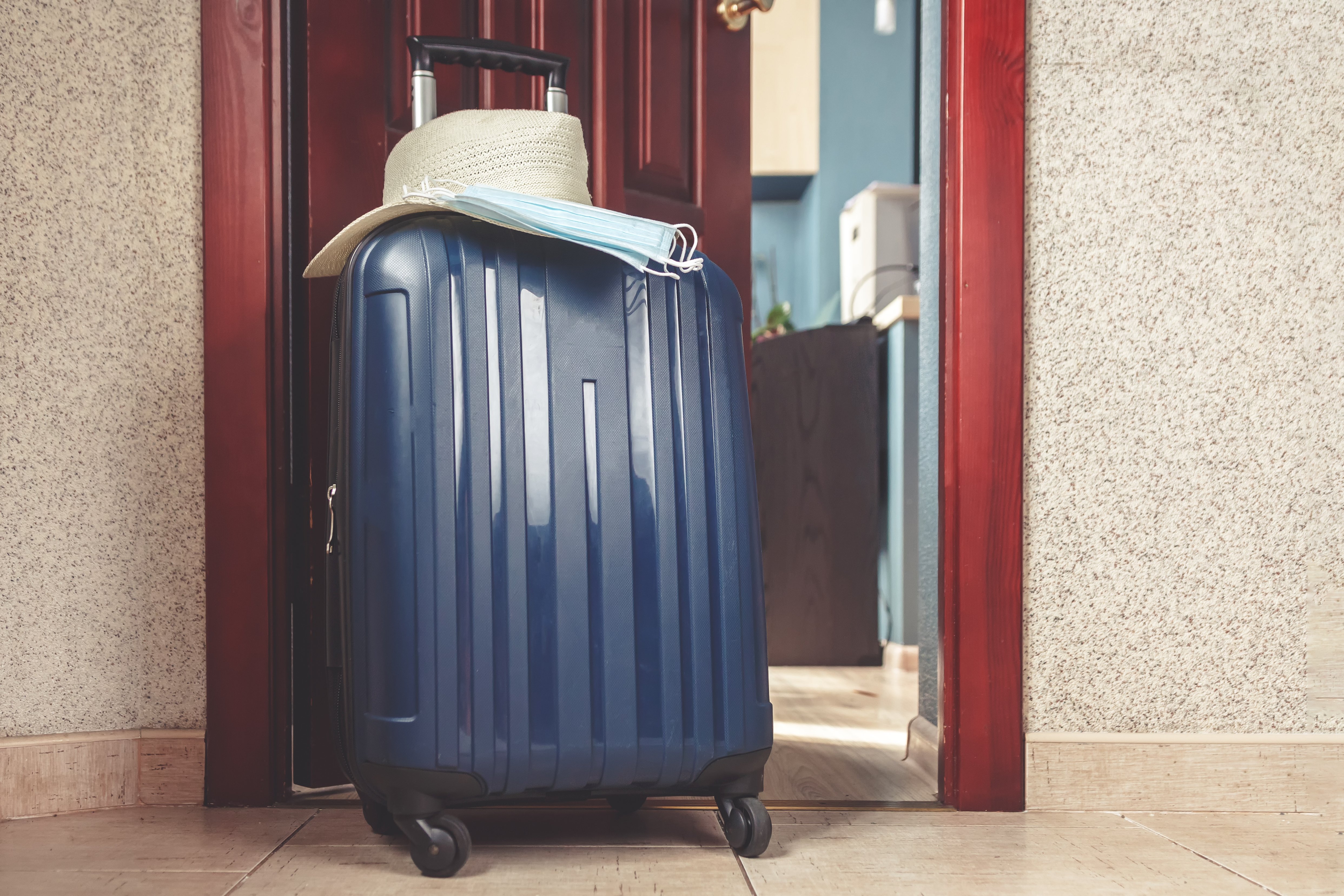 travel-suitcase-with-things-and-dreams-of-a-vacat-2023-11-27-04-51-02-utc